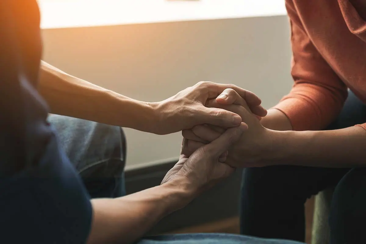 two people discussing a partial hospitalization program for mental health