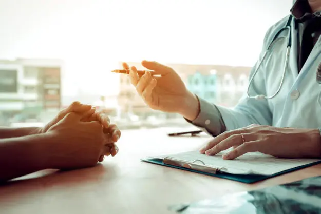 How Can Eastern Medicine Help With Mental Health Treatment therapist explaining eastern medicine