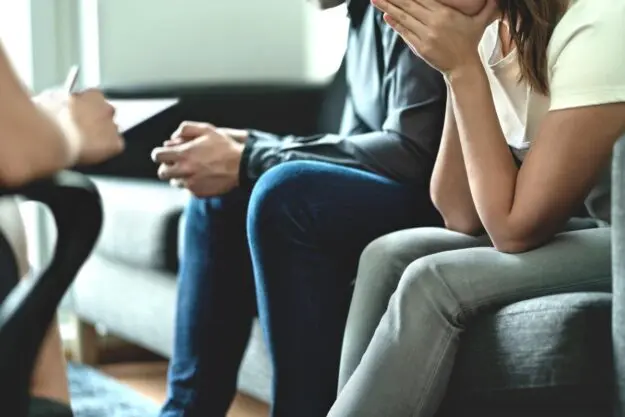 What to Do After Your Loved One Attempts Suicide a family rallies around their loved one after a suicide attempt and helps them through recovery