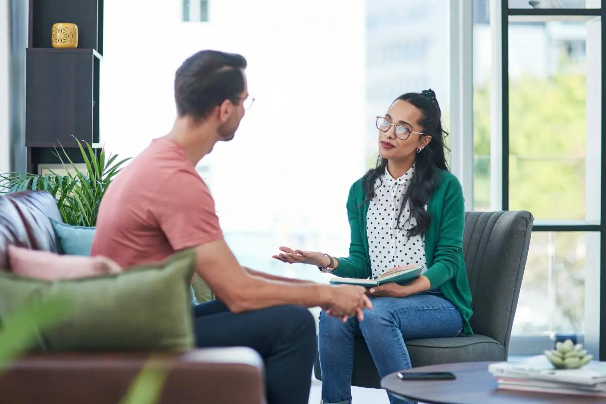 Is a Mental Health IOP Right for Me_ a person talks to a therapist about a mental health iop