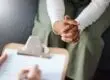 a woman meets with a professional for a depression diagnosis