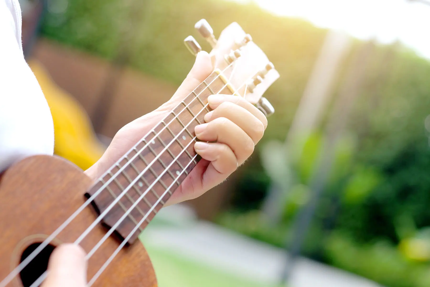 What are the Types of Music Therapy someone plays guitar to show the types of music therapy