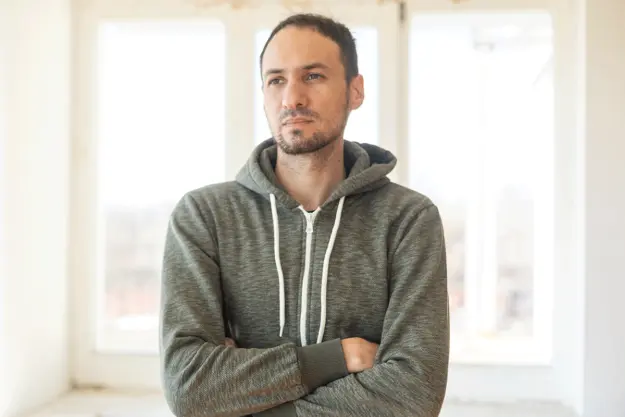 What-is-Self-Harm-OCD a man struggles with intrusive thoughts of self harm from ocd