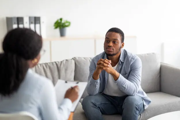 What to Do After Getting a BPD Diagnosis a man seeks professional therapy and support after receiving a bpd diagnosis