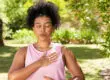 a woman takes up meditation to help manage her stress and anxiety