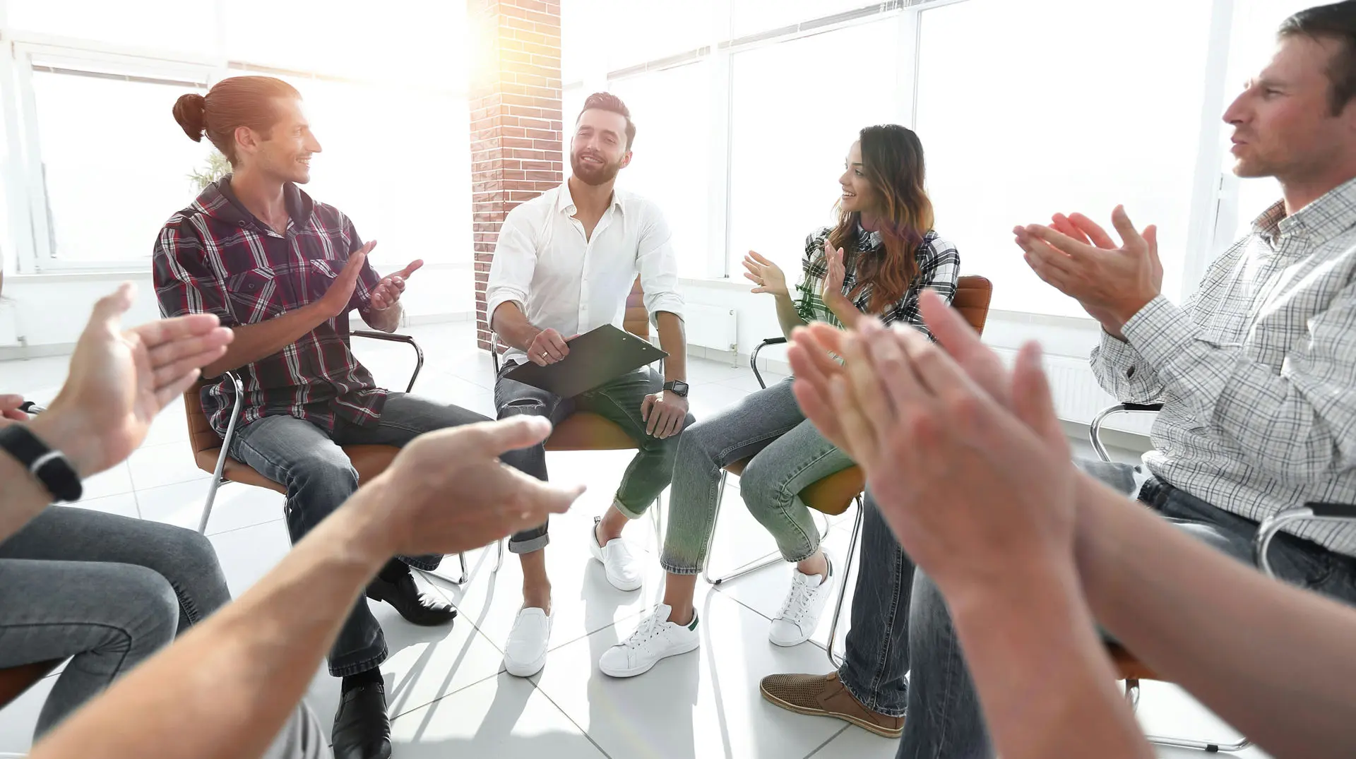 Group therapy session at Harmony Hills in Florida, where clients participate in Moral Reconation Therapy for recovery and personal growth.