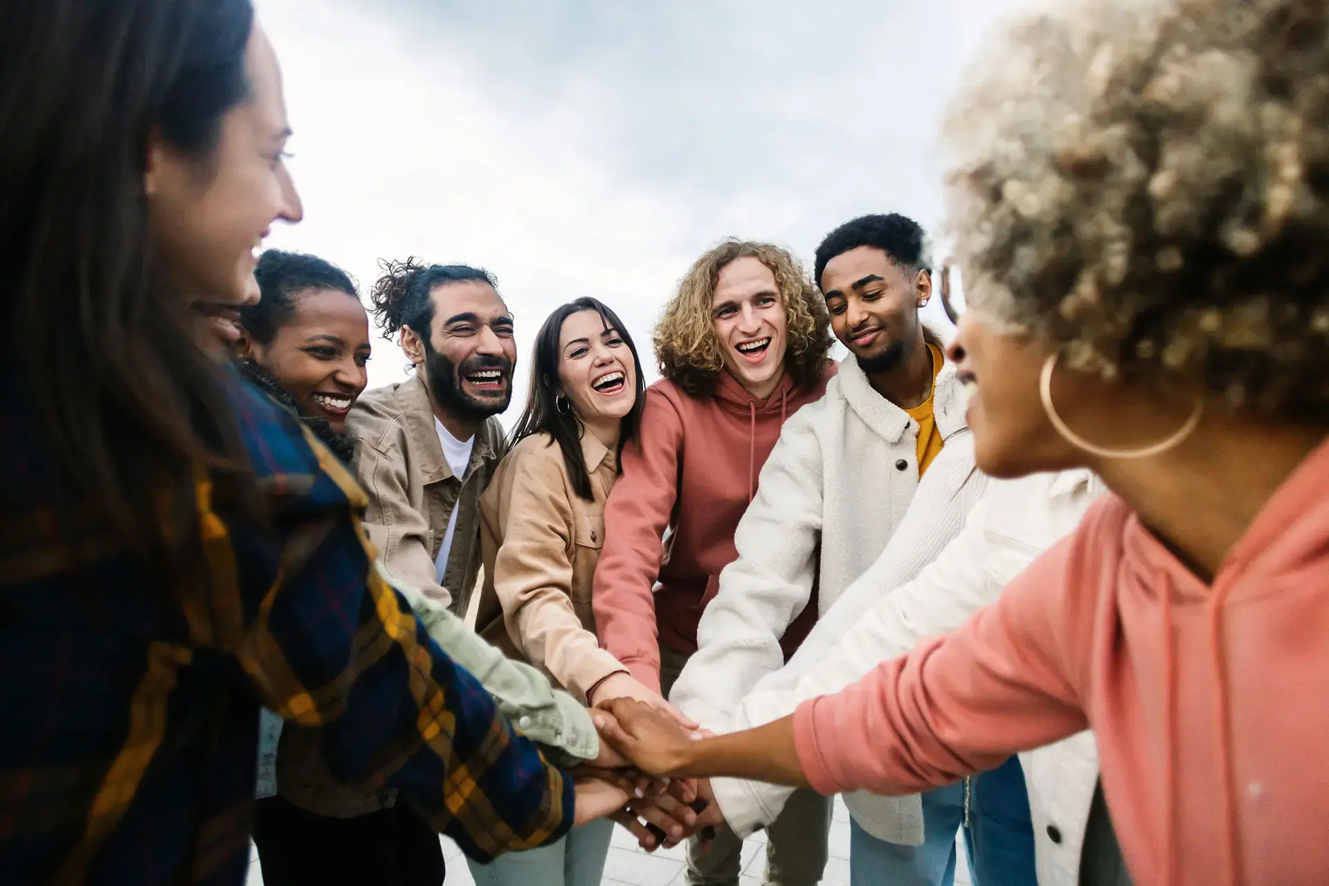 diverse community walking together at a recovery wwareness month event to honor healing and promote unity.