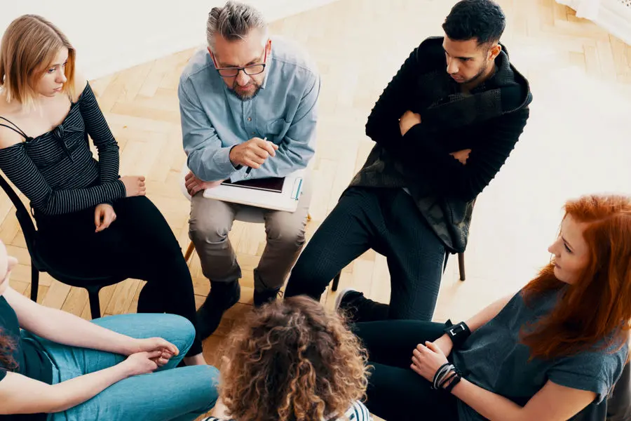 Group therapy helping individuals with schizophrenia build connection and skills