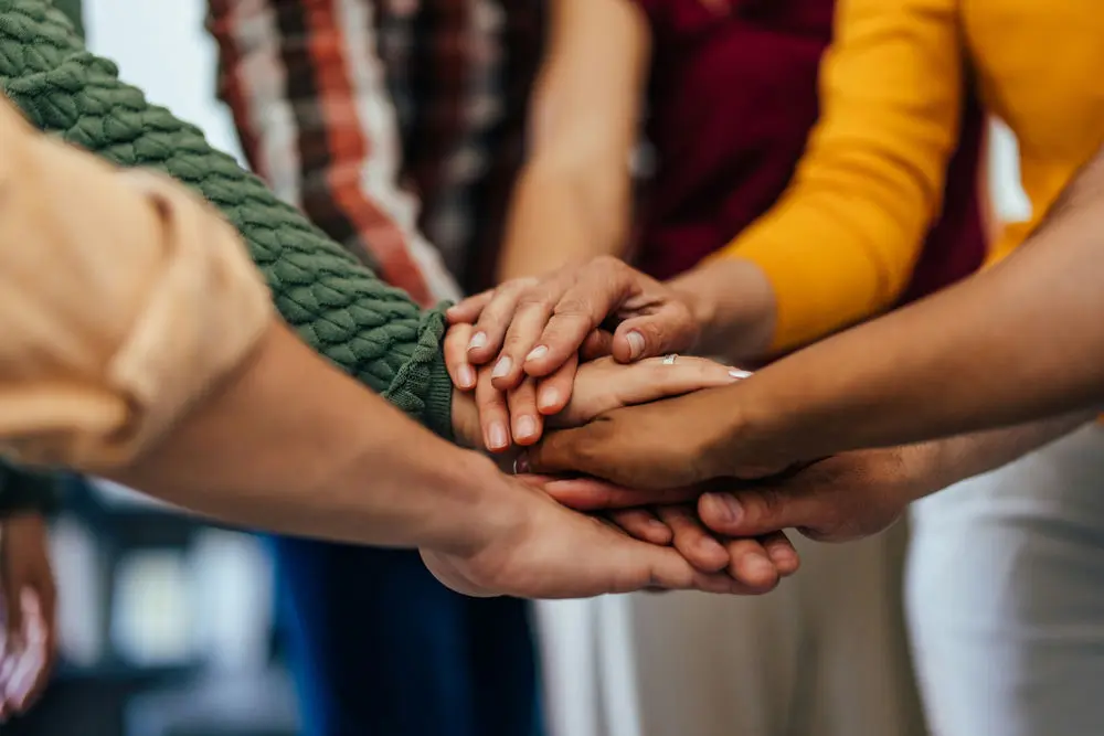 Group therapy session helping clients develop coping skills during residential treatment
