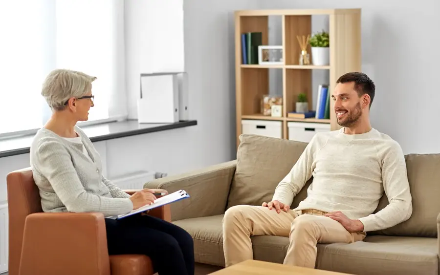 man in an individual session at an inpatient rehab center