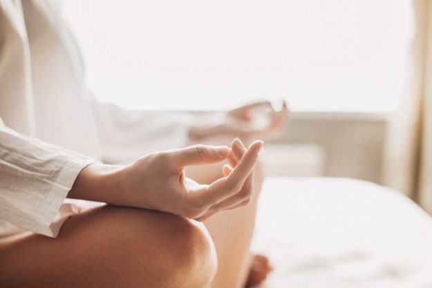 a woman practices different kinds of meditation