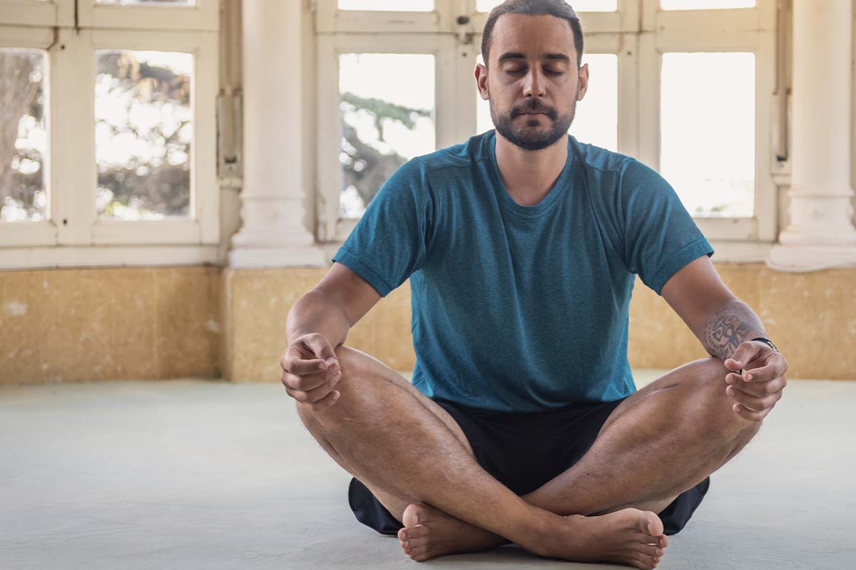 man meditating using spirituality in recovery