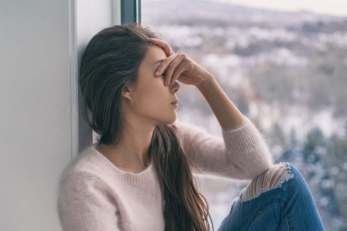 Woman struggling with seasonal depression
