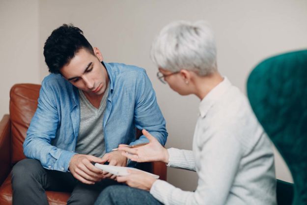 a young man sees his recovery benefit from a rehab aftercare program