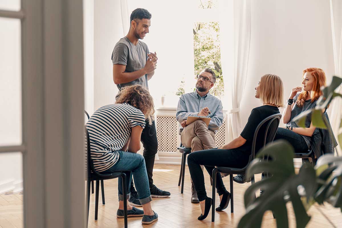 a group participates in a 12 step program