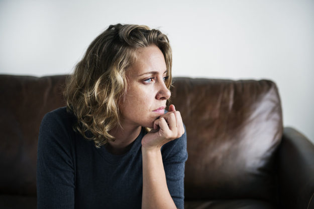 a woman debates her marijuana addiction