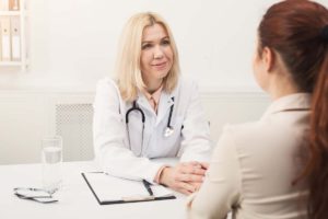 women discussing a residential treatment program for mental health