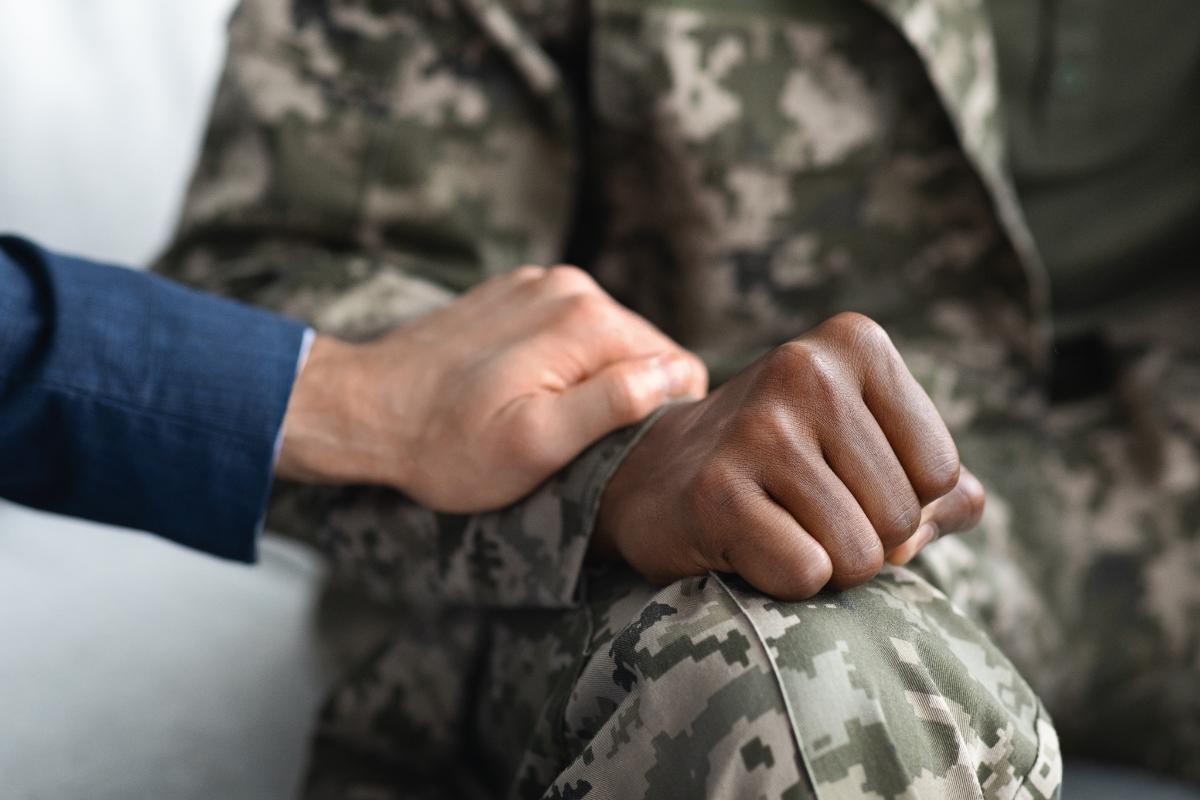 two individuals discussing military sexual trauma