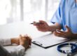 Therapist and patient discuss insurance coverage for mental health treatment