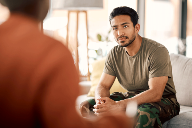 Person talking to their therapist about depression treatment for veterans