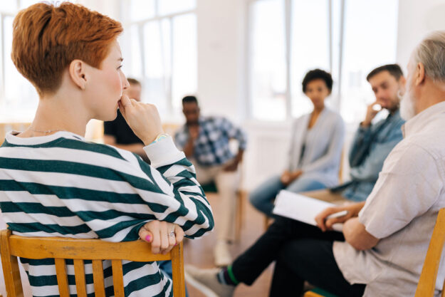 a group of people participate in a mood disorder treatment center florida