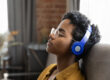 a person with headphones engaging in music therapy for depression