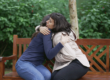 Two people hugging and learning how to talk about depression