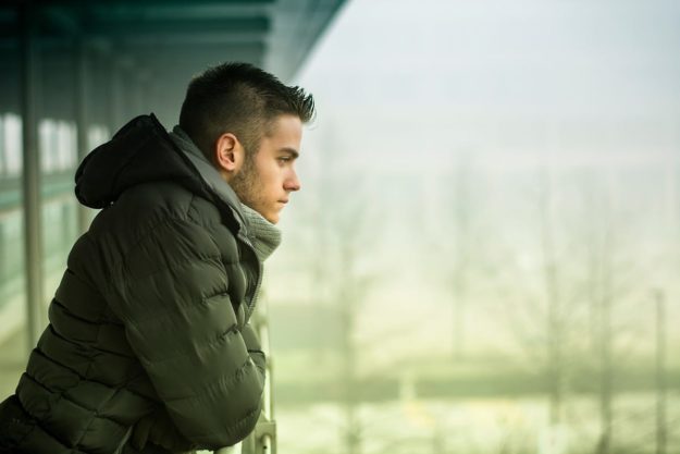 Man struggling with mental health and the holidays