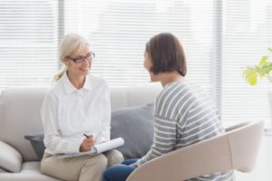 a woman receives helpful therapy as part of mental health treatment in florida 