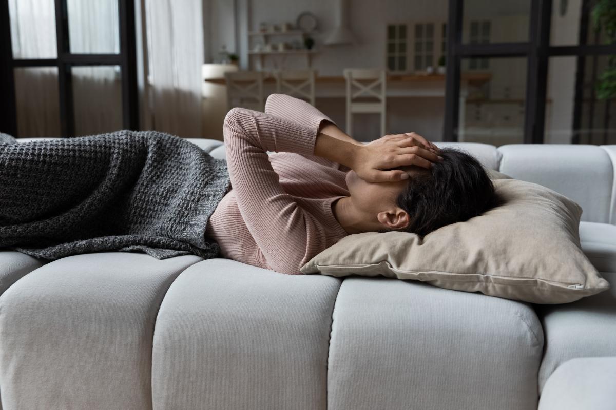 a young woman struggles to get out of bed due to depression and suicidal thoughts