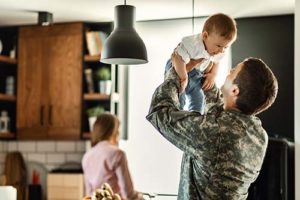 a military member bonds with his children after recovering from trauma treatment 