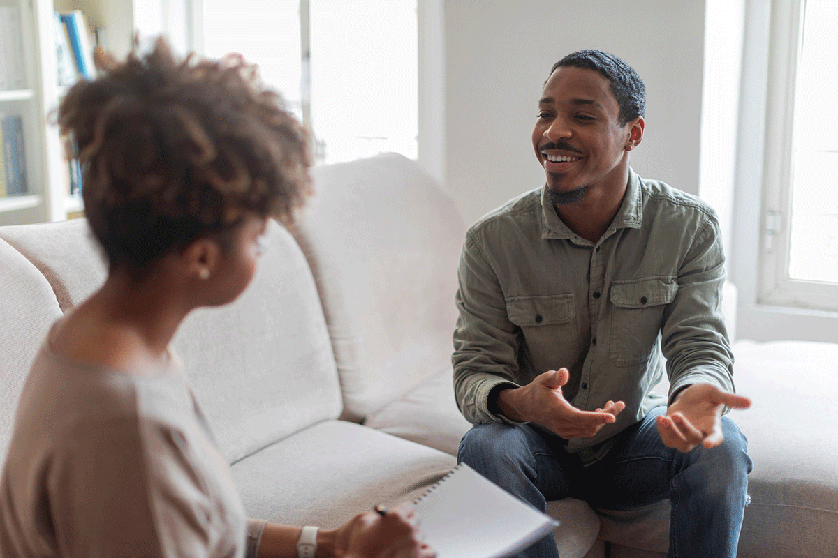 a man opens up in trauma therapy for ptsd