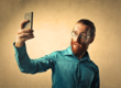 a person taking a selfie wonders what is narcissistic personality disorder