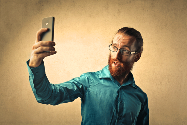 a person taking a selfie wonders what is narcissistic personality disorder