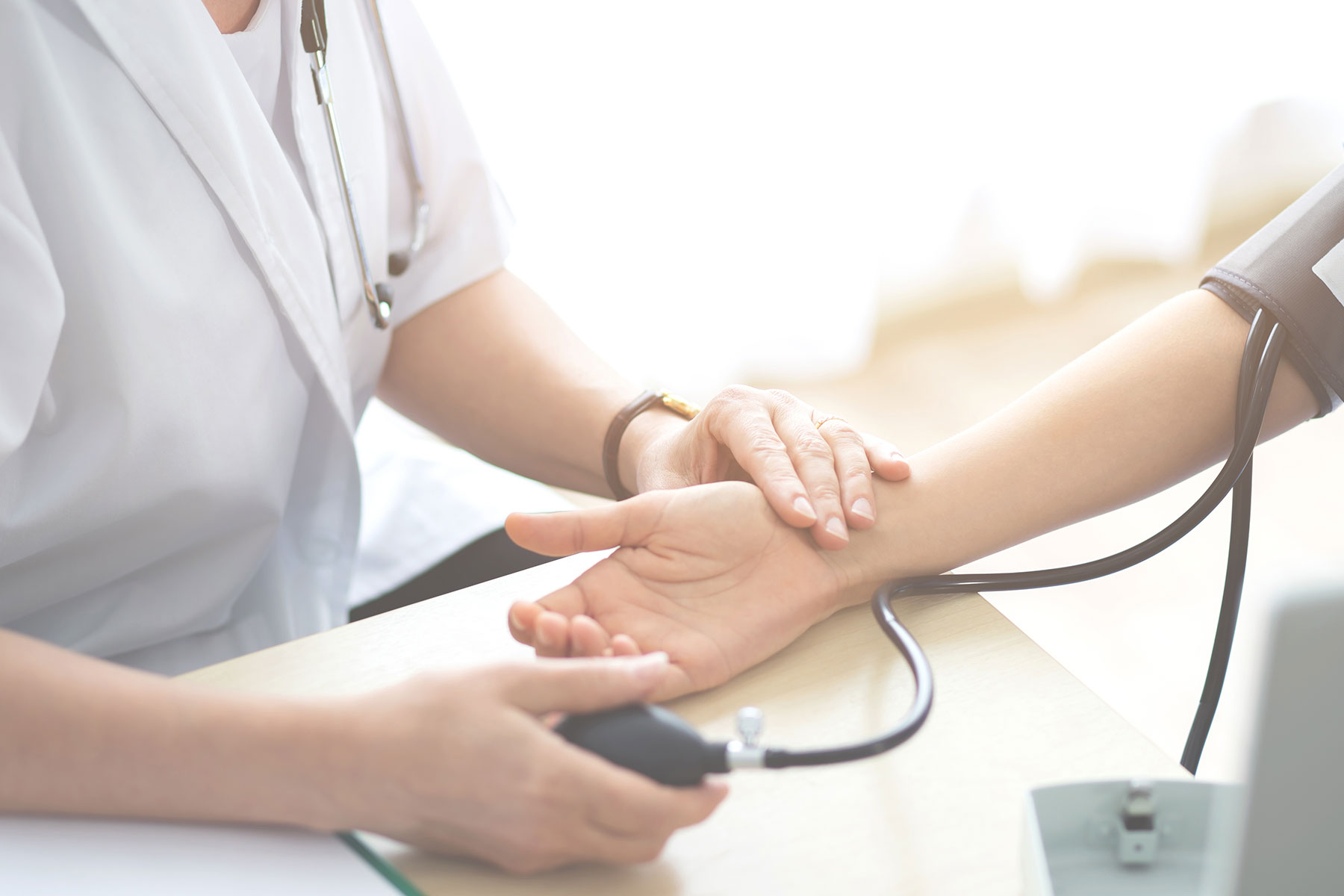 a person gets a blood pressure reading during an intensive outpatient program for depression