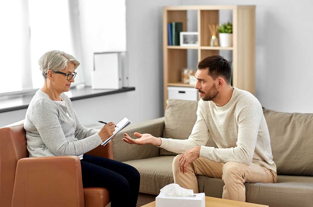 a man meets with his rapid resolution therapy provider