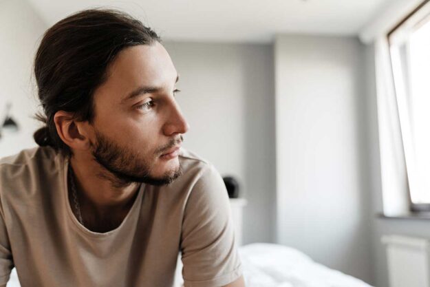 a young man struggles with depression and anger and debates seeking help