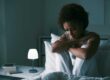 a woman struggles with insomnia due to the effect of anxiety on the brain