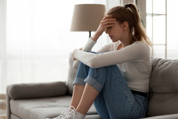 woman dealing with intrusive thoughts from ocd
