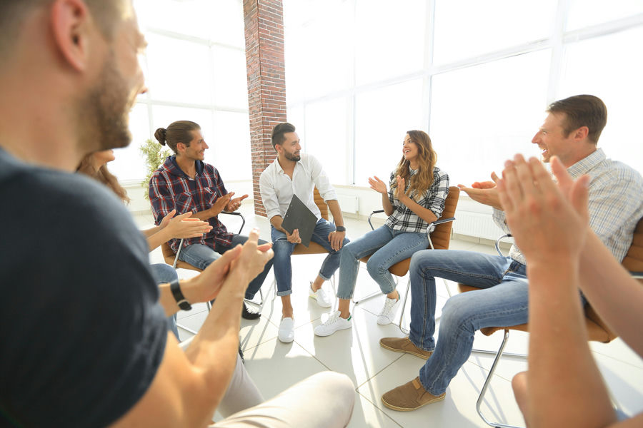 Support group gathering to reinforce recovery and mental health relapse prevention.
