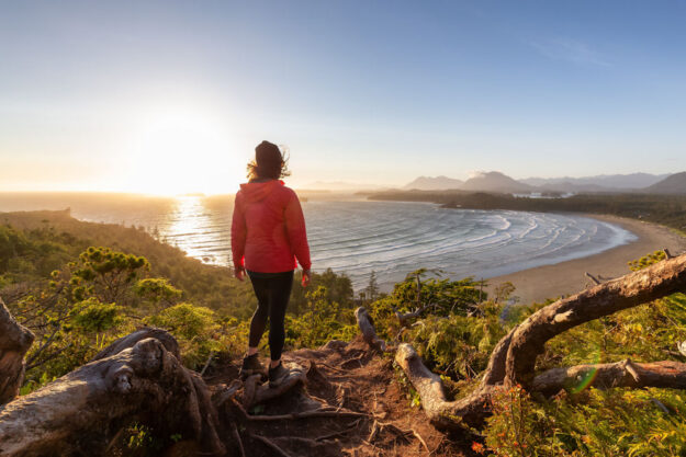 Person walking at sunrise, symbolizing the journey through recovery and the 5 rules of recovery
