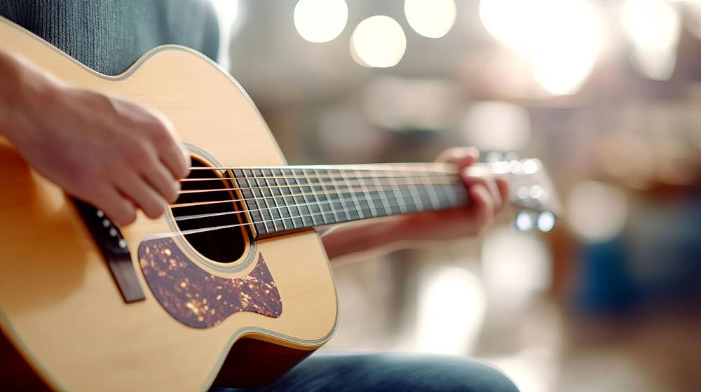 Board-certified music therapist leading a personalized session with a client at a music therapy program in Florida