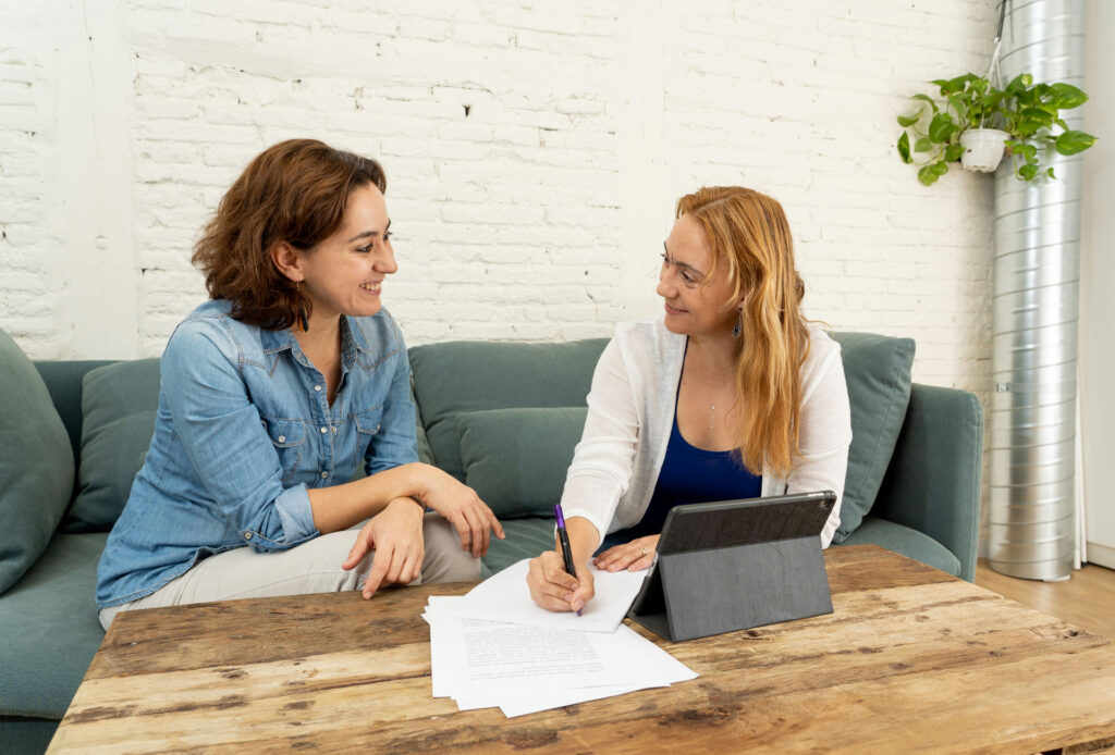 MRT® therapist in Florida guiding a client through structured one-on-one sessions and workbook exercises