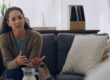 Individual discussing treatment-resistant anxiety with a therapist in a supportive setting.