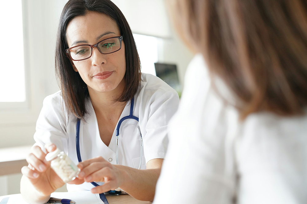 Therapist and client engaging in a dual diagnosis treatment session for anxiety and addiction.