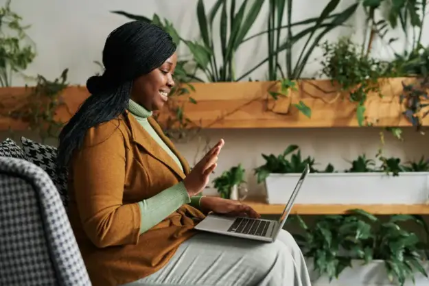 Woman attending an online depression therapy session via secure video call with a licensed therapist.