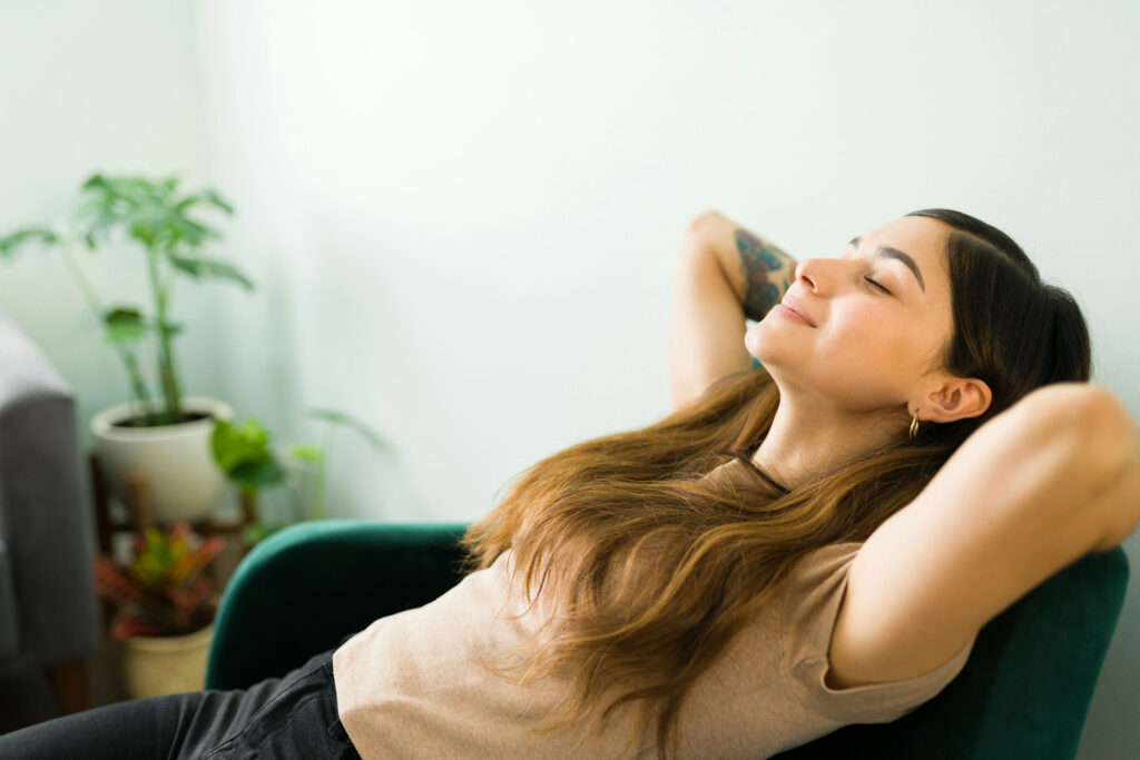 woman recovering after a panic attack, taking time to rest and regain calm