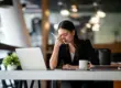 professional experiencing exhaustion while learning how to recover from burnout and manage stress.