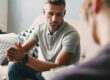 Therapist discussing inpatient vs outpatient mental health treatment options